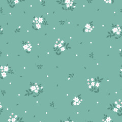Simple vintage pattern. white flowers and dots. green leaves. light green background. Fashionable print for textiles and wallpaper.