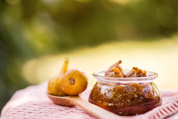 Ripe sweet figs. Healthy mediterranean fig fruit and slice figs on rustic wooden background