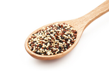 quinoa seeds in wooden spoon isolated on white background. close up quinoa seeds in wooden spoon isolated on white background. quinoa seeds in spoon isolated                 