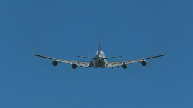 huge airplane jumbo jet take off  rear view
