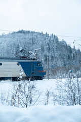 train locomotive at winter mountains