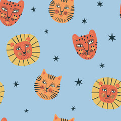 Hand-drawn animal seamless pattern. Funny tiger, lion, jaguar in cartoon stile. Cute cats and stars on blue background. Kids pattern design for fabric or wallpaper.