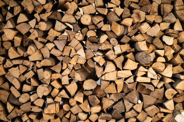 beautifully stacked firewood, natural wood for burning in the furnace