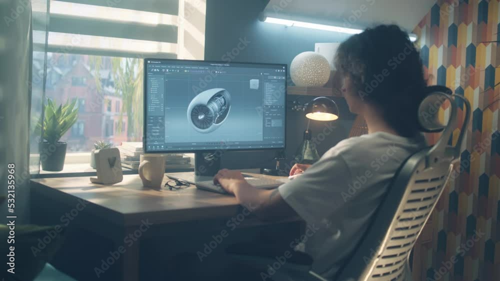 Poster male young engineer using pc with professional program and creating 3d prototype of airplane turbine