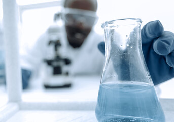 background image of scientists in the chemical laboratory