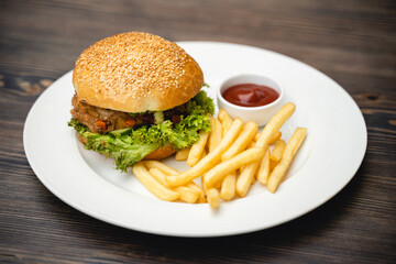 delicious dish of burger and french fries in a restaurant