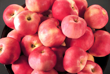 pink apples on a plate