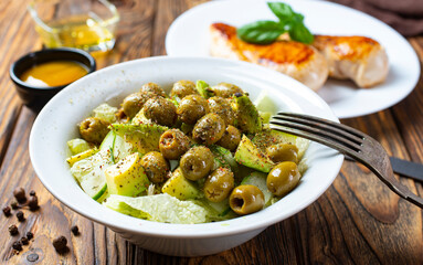 Greek salad. Fresh vegetable salad of cucumbers, tomatoes, olives, onion