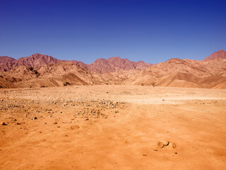 Hot afternoon empty desert view. Egypt mountains
