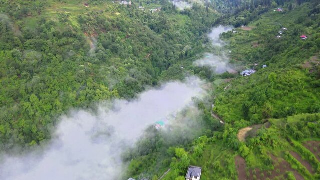 Drone Shot of a cloudy Sainj Valley in Himachal Pradesh near Manali, Kasol