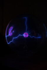 Science, electricity, child hand touch a space with electricity and make contact