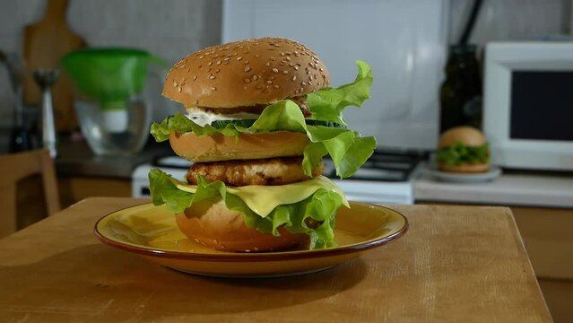burger with meat  moving around kitchen, parallax effect
