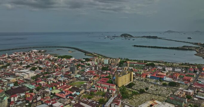 Panama City Aerial v26 panoramic view capturing cityscape along the coast across amador, casco viejo historic district and downtown metropolitan on a stormy day - Shot with Mavic 3 Cine - March 2022