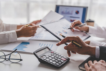 Young colleagues having great business conversations in a modern coworking office. Teamwork...