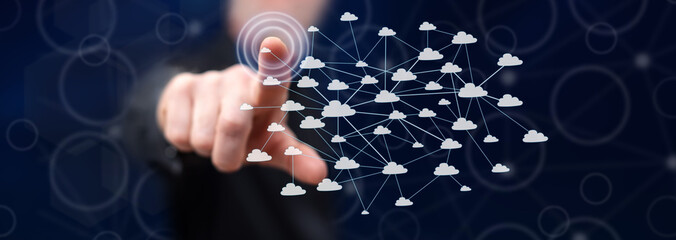 Man touching a cloud network concept