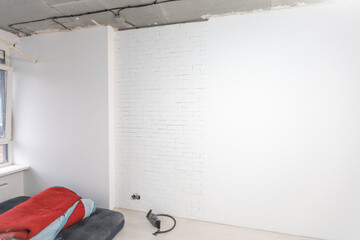 Interior renovation of a residential apartment using drywall without painting. Construction work indoors, renovation process inside the house