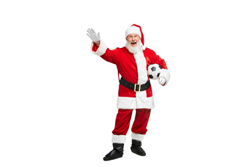 Portrait of senior man in image of Santa Claus posing with football ball isolated over white background. Sport fan