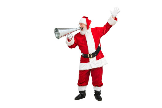 Portrait of senior man in image of Santa Claus shouting in megaphone isolated over white background. Notification