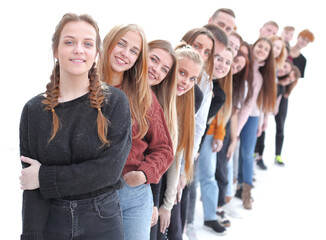 Obraz premium beautiful girl leader standing in front of her friends