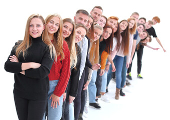 Fototapeta na wymiar group of cheerful young people standing behind each other