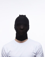 Man on a white background with an unknown face incognito anonymous criminal concept