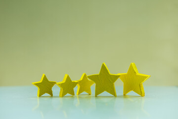 Satisfaction customer service survey concept, analyzing the questionnaire and combining the satisfaction score, giving satisfaction rating with five yellow stars