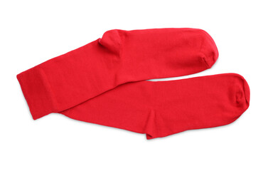 Pair of red socks on white background, top view