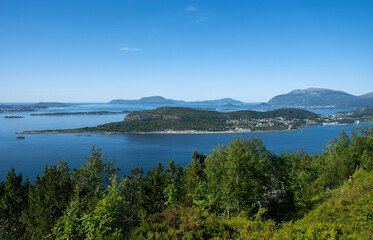 Fototapeta na wymiar Wonderful landscapes in Norway. Vestland. Beautiful scenery of Alesund town and surroundings. Summer sunny day. Selective focus