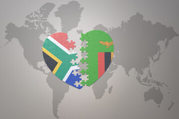 puzzle heart with the national flag of south africa and zambia on a world map background. 3D illustration