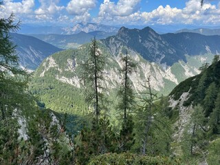 Fototapeta na wymiar view of green valley down Slovenian alps on the way to Mala Mojstrovka