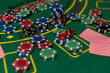 Poker cloth, a deck of cards, poker hand and chips. Background