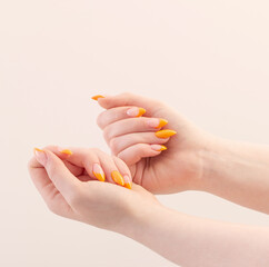 female hand with manicure on white background