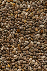 Chia seeds close up. Superfood concept. Isolated on white background.