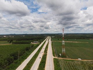 Fototapeta na wymiar Drone shot Aerial view scenic landscape of the rural highway, Countryside road