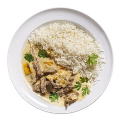 Beef Stroganoff with rice on plate isolated on white, top view