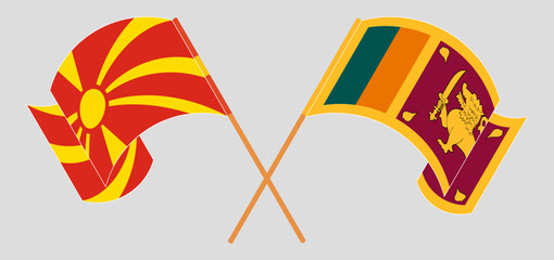 Crossed and waving flags of North Macedonia and Sri Lanka