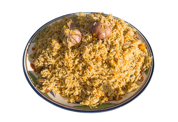 Pilaf with meat on plate isolated on white background. Uzbek pilaf isolated. Central asian dish from rice with meat and vegetable.