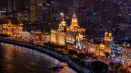 Panoramic view of historical buildings at the Bund, Shanghai at night.