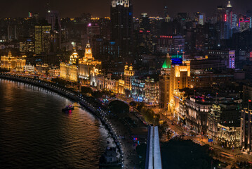 Fototapeta na wymiar Panoramic view of historical buildings at the Bund, Shanghai at night.