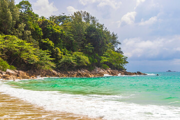 Fototapeta na wymiar Naithon Beach bay panorama with turquoise clear water Phuket Thailand.