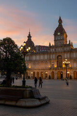 Obraz premium Vertical photo. Bench in the central square of Spain.