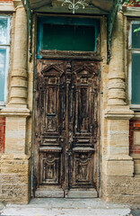 Fototapeta na wymiar Old rustic wooden doors and window