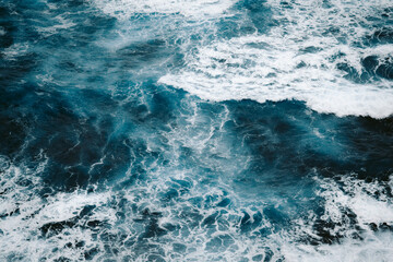 Foamy sea waves during storm