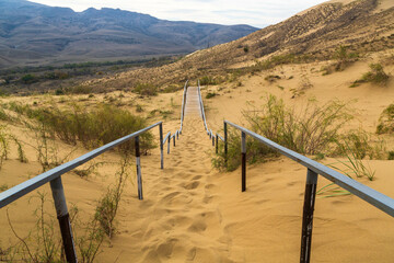 Stairs to Sarykum dune. Dagestan, Russia. A unique sandy mountain in the Caucasus