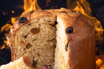 Panettone traditional Italian dessert for Christmas. Slices cut