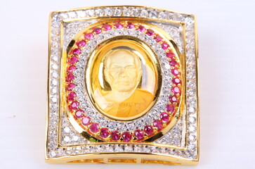 Golden Buddha Pendant Jewel on white Background
