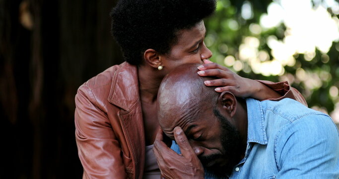 Man having emotional troubles, friend consoling African man