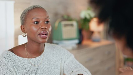 Black woman gossip and talking with friends on the sofa in her home. Young, black people chatting, speaking and having a conversation together in living room. Friendship, bonding and communication - Powered by Adobe