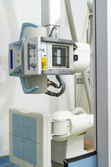 Professional x-ray device in modern hospital room. X-ray equipment healthcare radiology.
