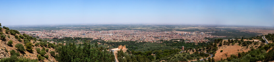 Fototapeta na wymiar Great panoramic view of the Moroccan city of Beni Mellal-Jenifra with its castle which is located between the Middle Atlas and the plain of Tadla, in the center of Morocco. Concept landscape, city.